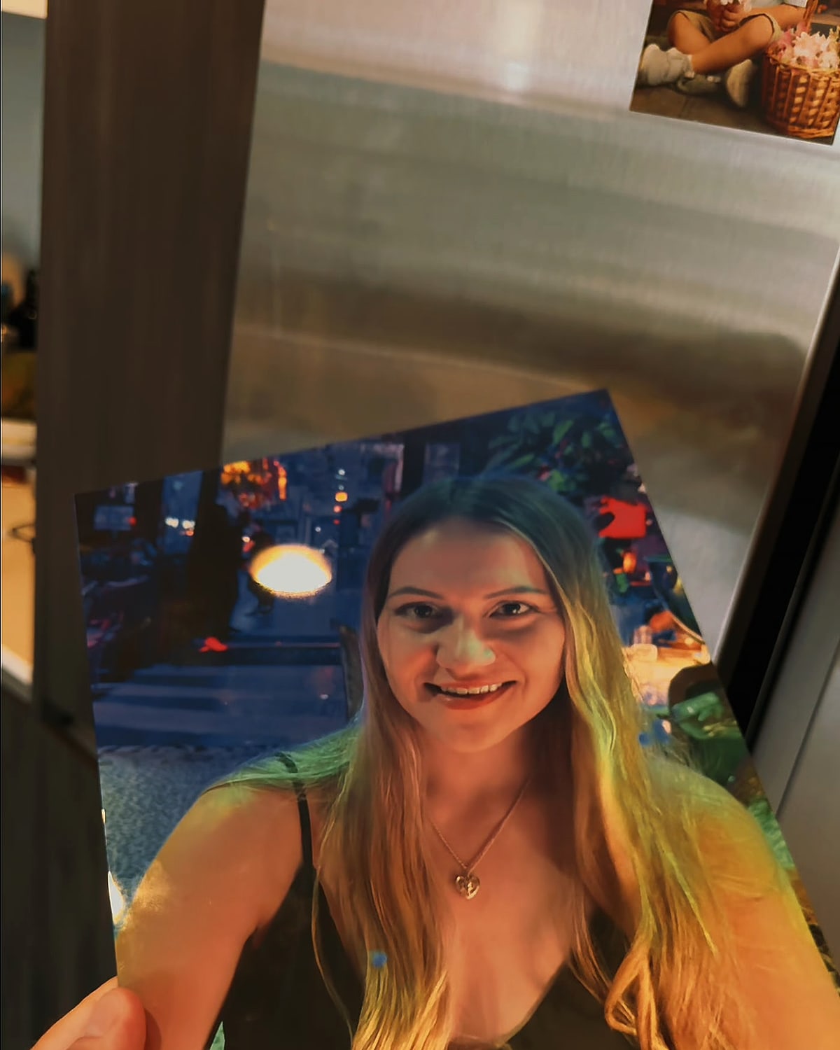 Photo magnets on a fridge